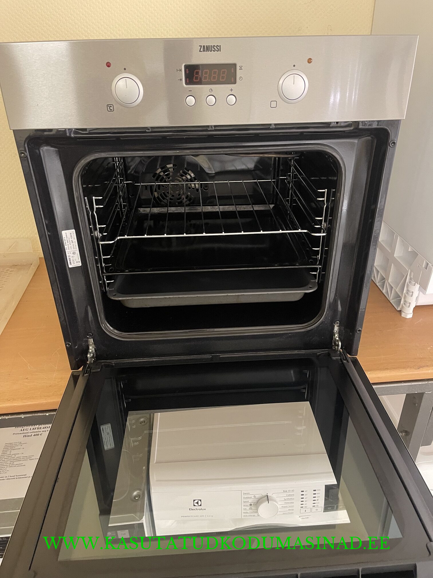 Kasutatud Zanussi ZOB483X integreeritav elektriahi – võimsus 2500 watti – 2 plaati, 1 rest – mõõdud 59,5x57x59,5cm. - Image 2